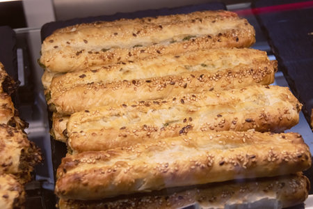 Ruddy long buns rollini on table close up