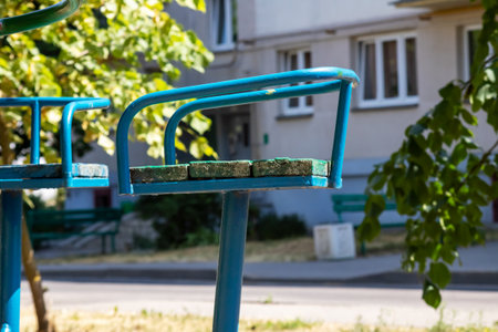 Old wooden swing in yard of house