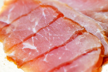 Red cuts of salted meat close up, macrophotoの写真素材