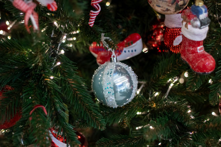 Close Up of a Christmas Tree With Ornaments close upの写真素材