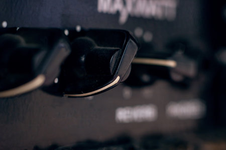 Knobs on Guitar Amplifier close up, macro photoの写真素材