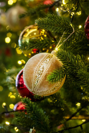 New Year's decorations on green spruce branches close upの写真素材
