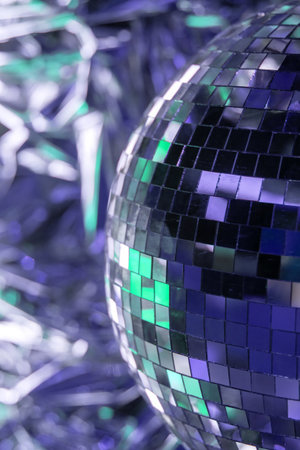 Shiny disco ball in blue tones close upの写真素材