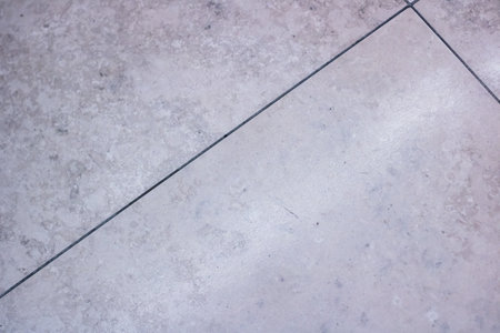 Old gray paving slabs close up, background or textureの写真素材