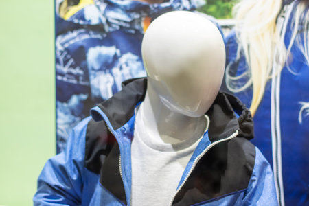 Baby mannequin in bright clothes in store close upの写真素材