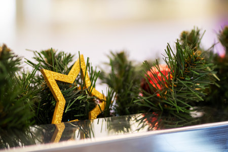 Here is a beautifully detailed close up of a Christmas tree, showing its lovely decorations adorning...