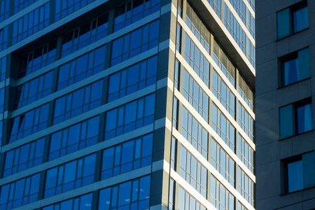 A very tall building that features a substantial number of windows, designed to allow plenty of...