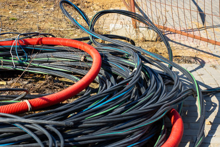 A diverse collection of colorful coiled cables with various textures for effective electrical system...