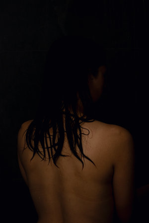 A serene and intimate moment beautifully captured in soft shadows, evoking deep tranquility and...