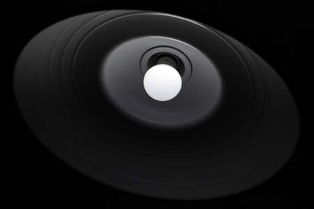 Lamp in dark room, seeing from below, low angle shot, black background.の写真素材