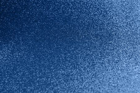 Blue sparkling abstract background. Festive concept. Color 2020 concept.の写真素材