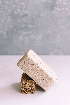 Pieces of different natural stones on a light background, eco concept, different texture, gravity, Natural mineral.の写真素材