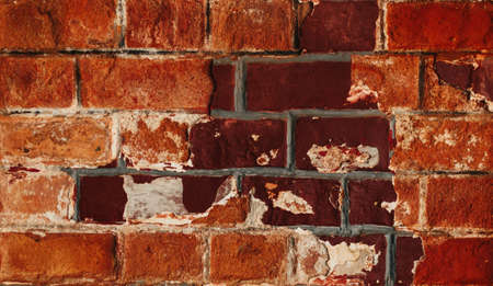 Background of red brick wall pattern texture. Great for graffiti inscriptions.の写真素材