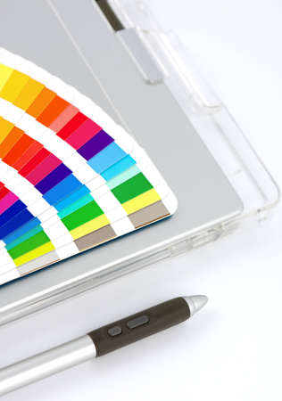 Colour Chart, Graphics Tablet And Pen, close-up view on white with feint shadow.の写真素材