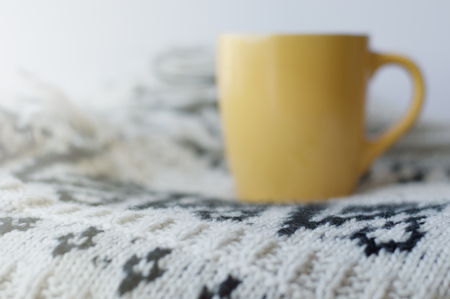 Background with a mug and blanketの写真素材