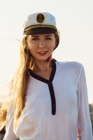 Portrait of a girl dressed in marine styleの写真素材