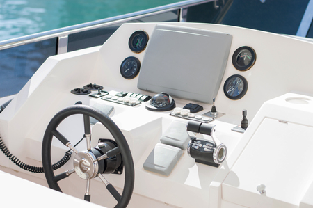 Captain wheel on the luxury white yachtの写真素材