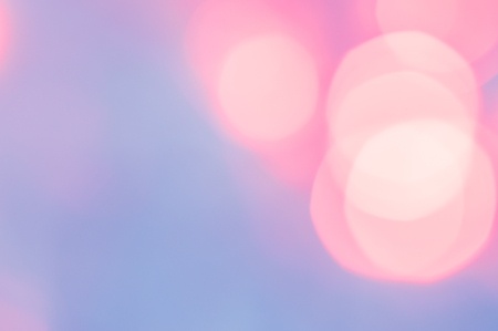 Background with bokeh effect. Blurred lights. Blue, yellow and purple colorの写真素材