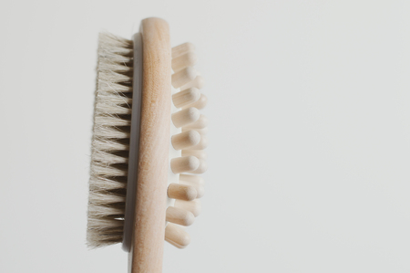 Multipurpose wooden brush for dry anticellulite massage. Cellulite treatment toolの写真素材
