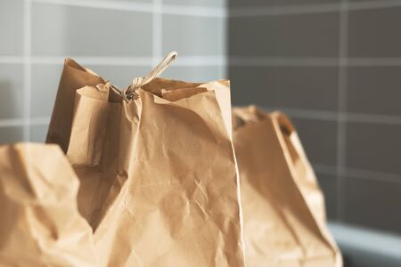 Food delivery service. Brown recyclable paper bags