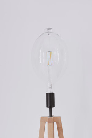 Wooden lamp with big bulb for minimalistic home decor