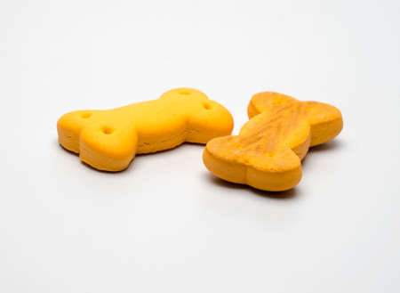 bone shaped dog food on white background