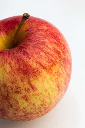 fresh Gala apple on a white backgroundの写真素材