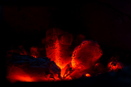 Burning charcoal on black backgroundの写真素材