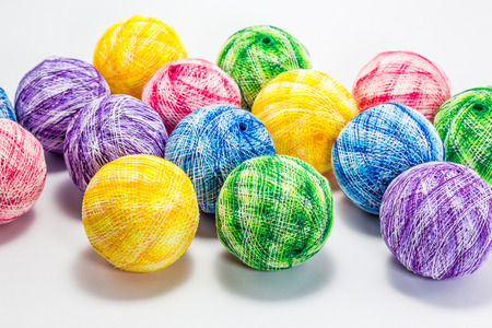 lamp ball make from strand various colors on white backgroundの写真素材