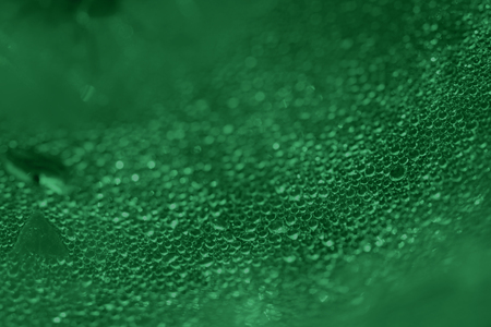 Defocused abstract green lights background.