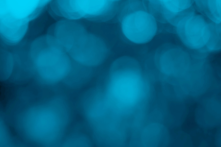 Abstract blue bokeh on back background.の写真素材