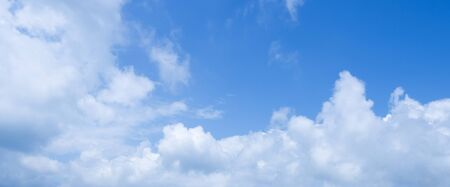 The beautiful blue sky with white clouds in the daytime.