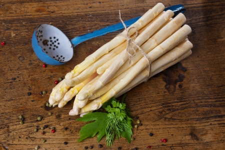still life with asparagus on wooden tableの写真素材