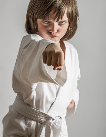 a little girl practicing karateの写真素材