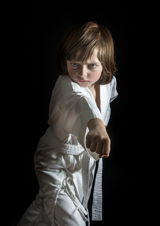 a little girl practicing karateの写真素材