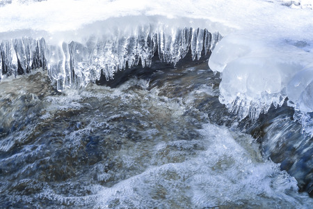 icicles and a river waterの写真素材