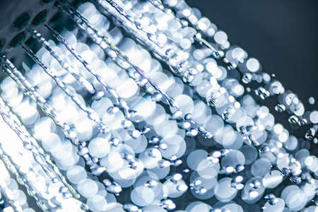 Water flowing from shower - close up - macro detail - high speed photoの写真素材