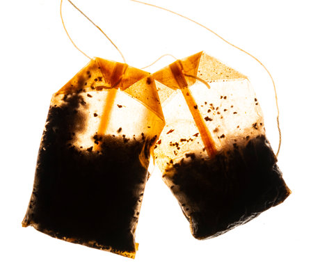 Used tea bags isolated on white backgroundの写真素材