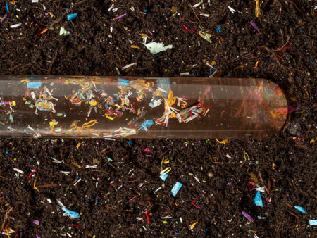 Microplastics in soil a test tube with soil sample - soil contaminated with mineral microplasticsの写真素材