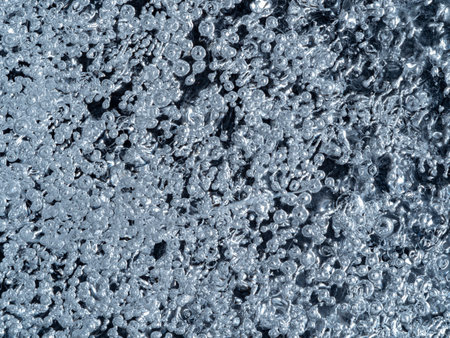 ice texture with bubbles close up in the detail - macro photography