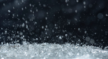 Macro photography of rain on a black background. Abstract background.