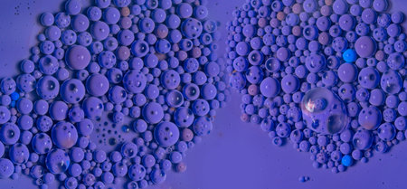 watercolors and oil artistic macro photography, behaviour of oil and water when brought togetherの写真素材