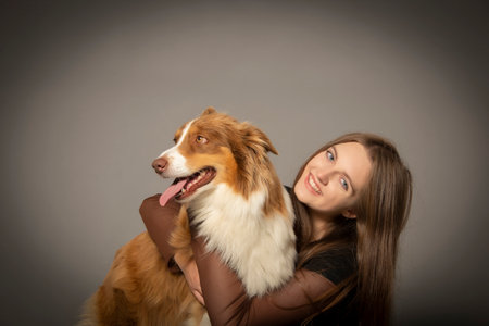 portrait of friends - cute dog and girlの写真素材