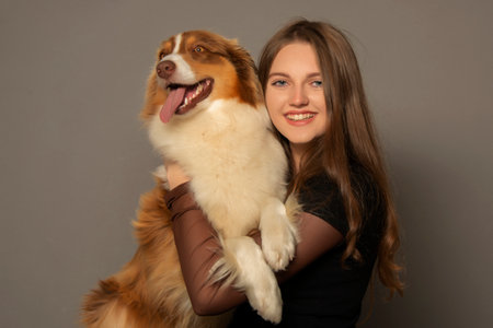 portrait of friends - cute dog and girlの写真素材