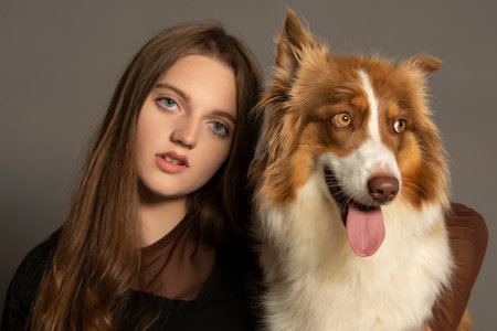 portrait of friends - cute dog and girlの写真素材