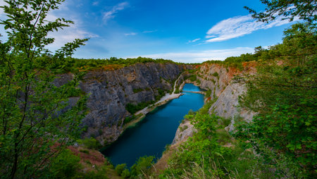 limestone quarry America with lake in Czech Republicの写真素材