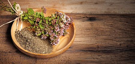 Origanum vulgare (oregano) herb - spice on a tableの写真素材