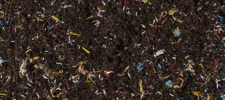 Microplastics in soil - soil contaminated with mineral microplasticsの写真素材