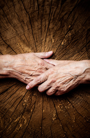 old hands and old treesの写真素材