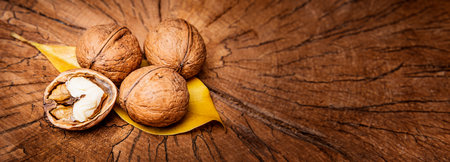 walnuts on a wooden backgroundの写真素材